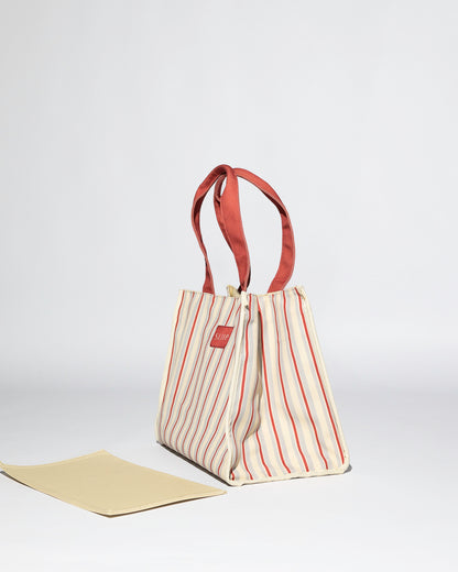 side view of red, blue and beige versa bag, tote bag, with base out, casual mode, structure 
