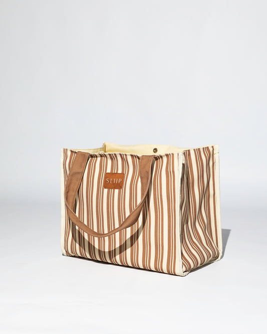 brown and beige striped tote bag with brown handles 